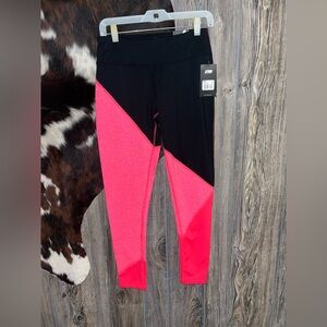 Marika Tek NWT size medium black, pink and red colorblock leggings